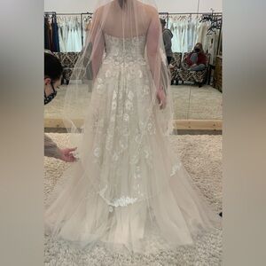 Serenity wedding dress, never used,off white color with beautiful lace detailing